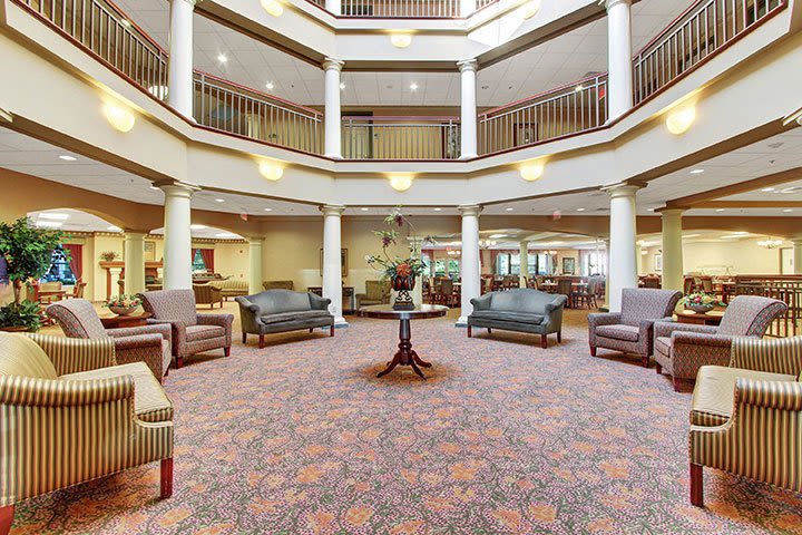 Spacious atrium lobby with seating and balconies
